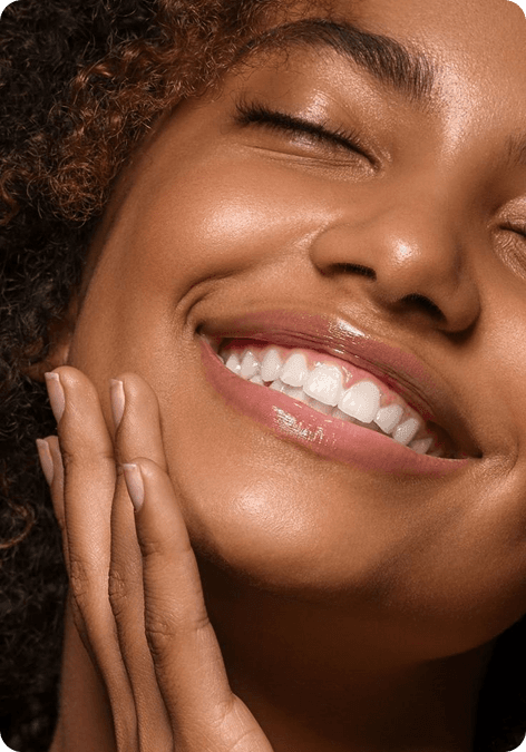 Confident woman with glowing skin
